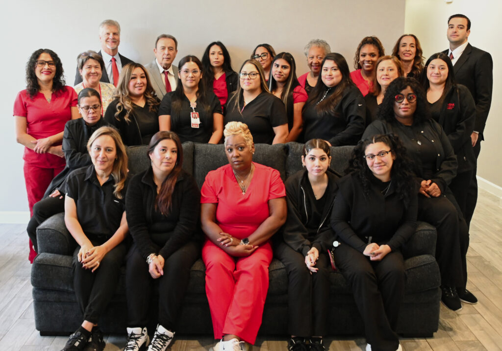 Group of people in uniform attire.